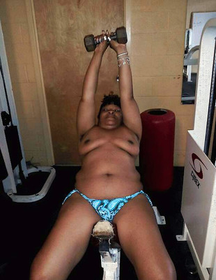 Elegant naked black mommy in the gym
